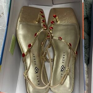 Elegant Gold Sandals with Red Accents